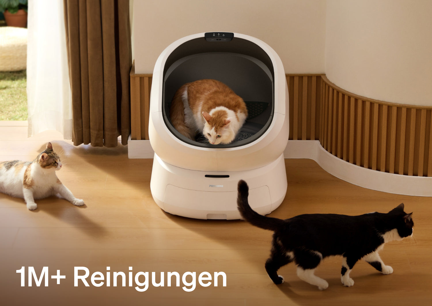Petlibro PETLIBRO Katzentoilette, weiße Kapsel; Katze darin, zwei Haustier-Katzen davor; Brunnen-Design, Text „1M+ Reinigungen“